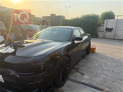 دۆج چارجەر